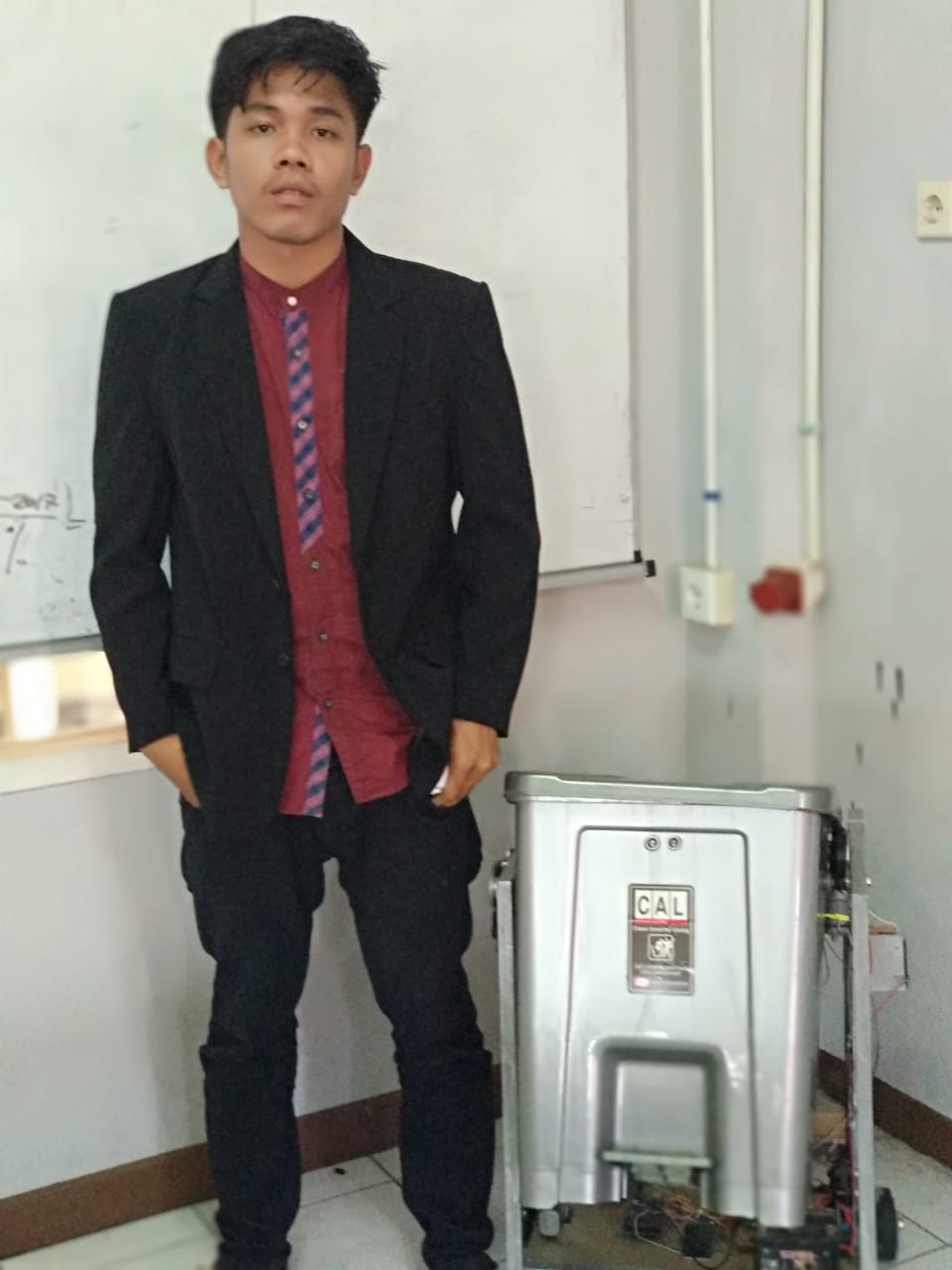 Dafitra Juhanda, Mahasiswa Prodi Teknik Elektronik Berhasil Membuat Robot Bak Sampah Berbasis Arduino Mega 2560